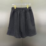 Balenciaga Flaming Unity distressed cotton-jersey shorts in black - Image 10