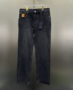 Louis Vuitton black denim pants with a Monogram Macro motif - Image 3