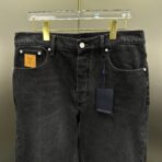 Louis Vuitton black denim pants with a Monogram Macro motif - Image 7