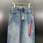 Balenciaga logo-embroidered wide-leg jeans in light blue cotton denim - Image 8