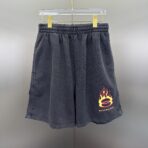 Balenciaga Flaming Unity distressed cotton-jersey shorts in black
