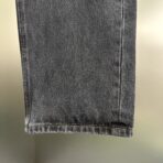 Louis Vuitton black denim pants with a Monogram Macro motif - Image 9