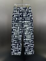 Louis Vuitton denim skate pants with an all-over graphic print
