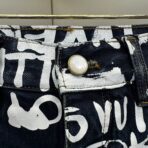 Louis Vuitton denim skate pants with an all-over graphic print - Image 14