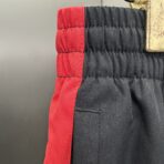 Balenciaga I Puma Large Tracksuit Pants in Black/red - Image 11